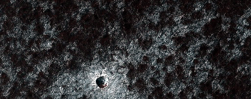 Monitoring New Small South Polar Layered Deposits Crater
