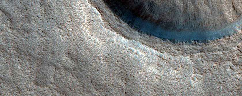 Dipping Layers in Craters in Northern Mid-Latitudes