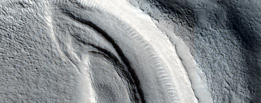 Layered Feature in Crater in Nilosyrtis Mensae