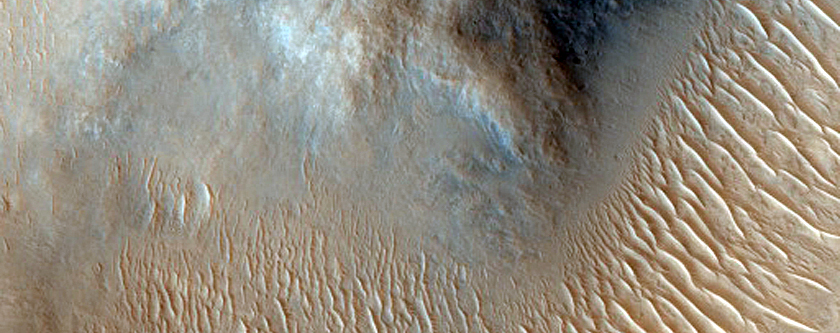 Crater Outflow in Western Amenthes Planum