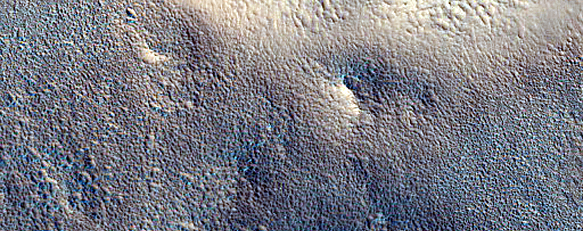 Layered Deposit in Crater South of Renaudot Crater