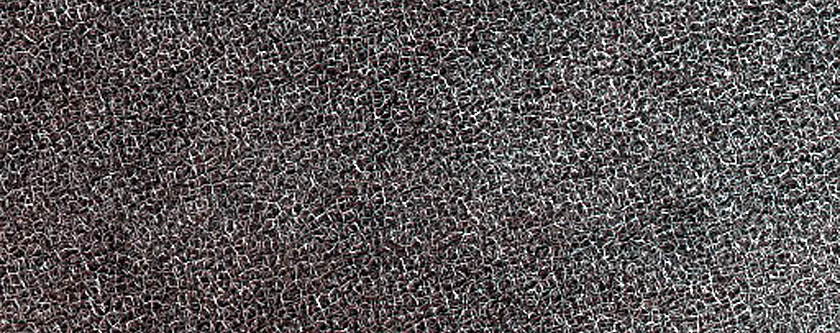 Mounds and Pit on Thick Carbon Dioxide Ice