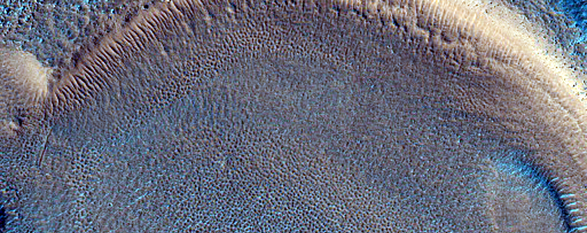 Dipping Layers in Craters in Northern Mid-Latitudes