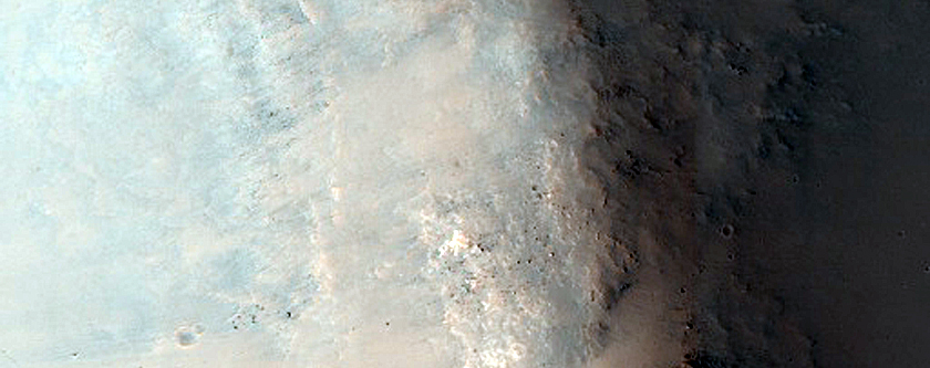 Channel and Crater North of Huygens Crater