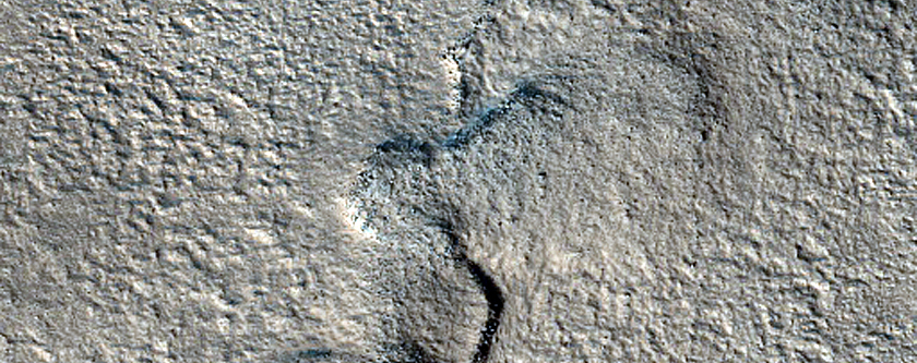 Possible Terminus of Glacial Valley Flow in Phlegra Montes