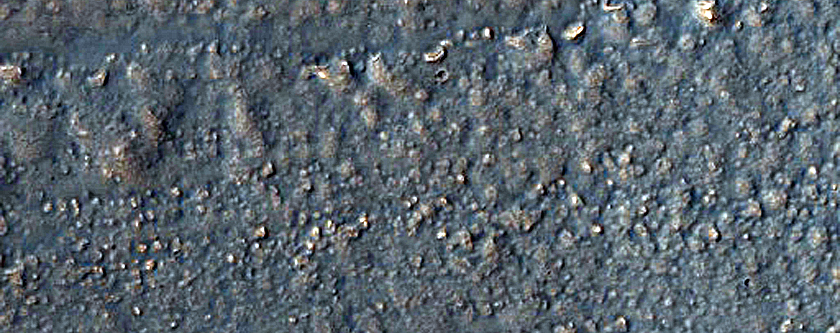 Crater with Concentric Crater Fill in Claritas Fossae