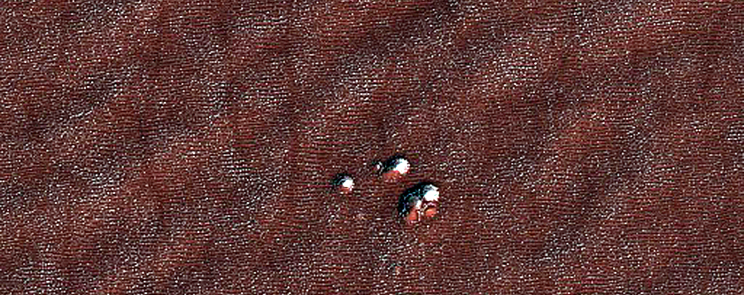 Potential South Polar Layered Deposit Crater Cluster