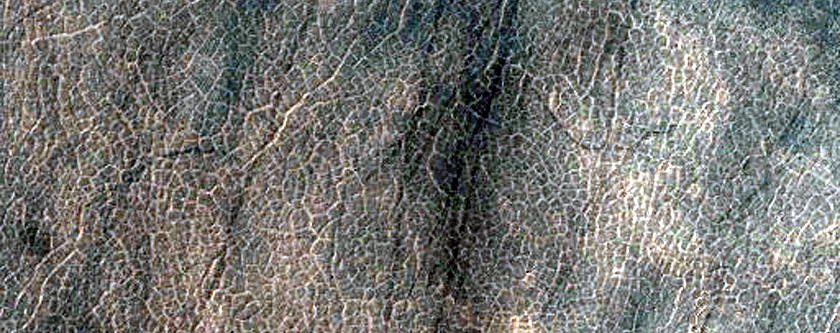 Eroding Deposits on Floor of Barnard Crater