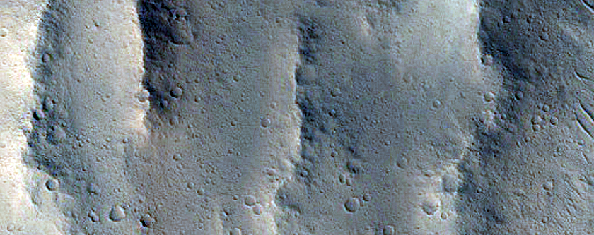 Candidate Recent Impact Site in Sacra Sulci