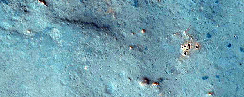 Phyllosilicates in Eastern Ejecta of Negril Crater