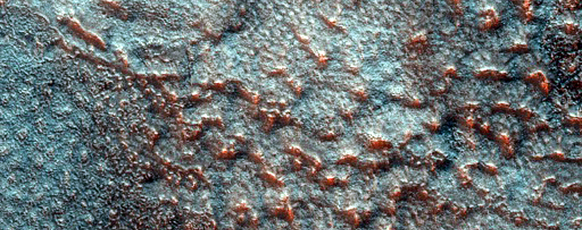 Light-Toned Mounds and Impact Ejecta