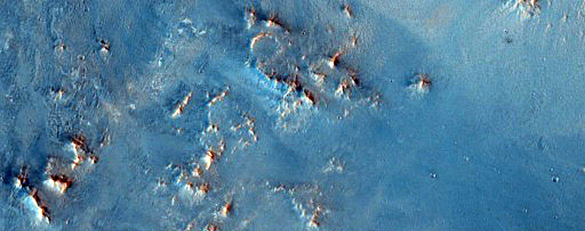 Phyllosilicate-Rich Terrain Adjacent to Toro Crater