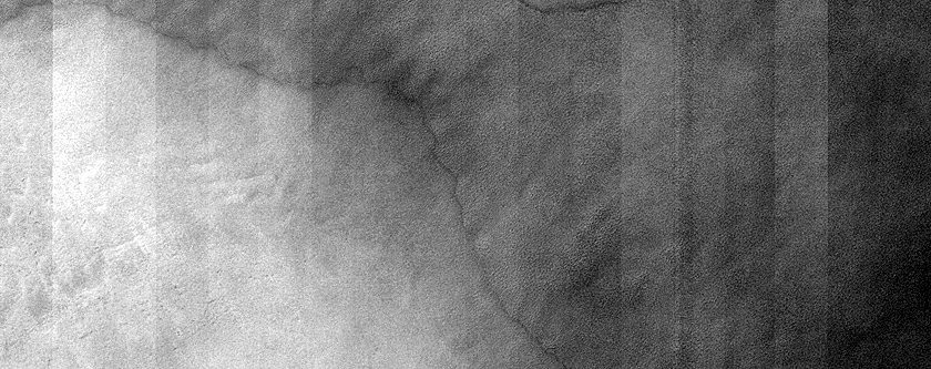 Narrow South Polar Carbon Dioxide Deposit