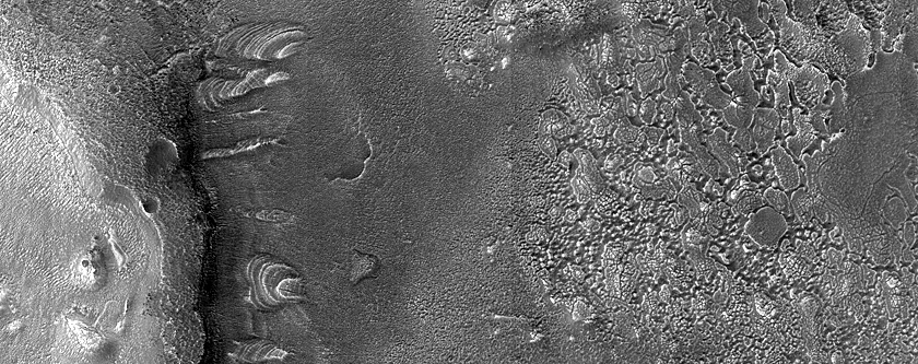 Dipping Layers Against Mound in Deuteronilus Mensae
