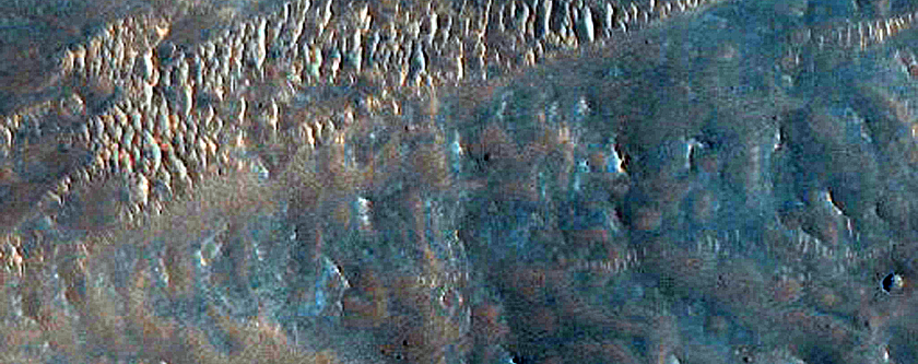 Possible Melt Flows From Oudemans Crater