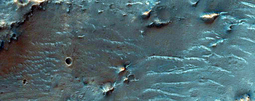 Tyrrhena Terra Crater Ejecta with Hydrated Minerals