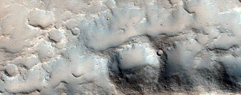 Crater East of Hecates Tholus