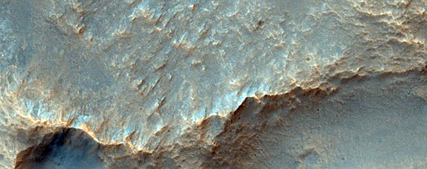 Channel Entering Crater North of Hellas Planitia