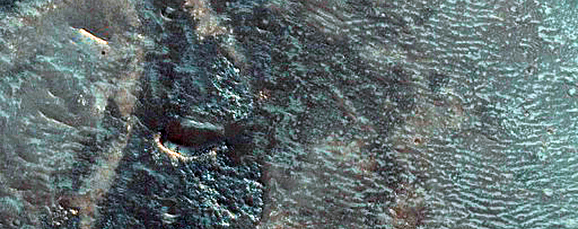 Sinuous Feature Connecting Two Flat-Topped Deposits in Wahoo Crater