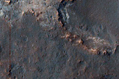 Mawrth Vallis Dark-Toned Cap Associated with Well-Preserved Crater Ejecta 
