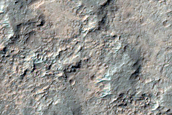 Dark-Toned Features in Light-Toned Layer