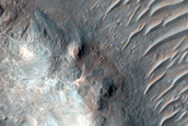 Possible Low-Calcium Pyroxene Block on Central Ridge in Her Desher Vallis
