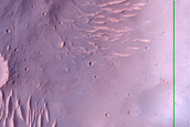 Crater with Outlet Channel in Southern Highlands