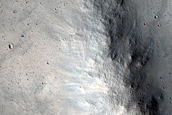 Relatively Fresh Crater with Central Pit and Layered Ejecta
