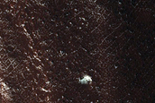 Eroding Deposit on Floor of Crater South of Hellas Planitia