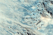 Spectrally Distinct Materials near Crater in Tyrrhena Terra