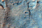 Possible Bedrock Exposures near Hellas Planitia