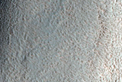 Streamlined Island in Channel in Aonia Terra