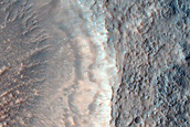 Transition between THEMIS Nighttime IR Dark and Bright Materials