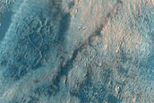 Rectilinear Ridges near Ice-Rich Material in Nereidum Montes