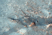 Exposures of Bedrock Associated with Circum-Hellas Planitia Massifs