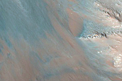 Monitor Low-Albedo Slopes along Coprates Chasma Ridge