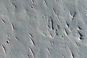 Chain of Pits Between Ceraunius Fossae and Ascraeus Mons