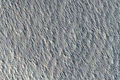 Pit near Biblis Patera