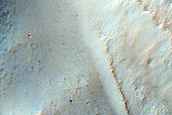 Gully Associated Light-Toned Materials in Crater in Terra Cimmeria