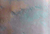 Layered Materials Exposed in Crater near Uzboi Vallis