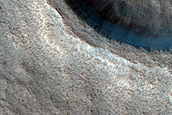 Dipping Layers in Craters in Northern Mid-Latitudes