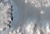 Contact between Distal Arsia Mons Lavas and Noctis Labyrinthus Grabens