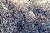 Layered Deposit in Crater South of Renaudot Crater