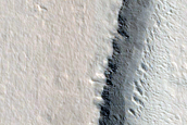 Impact-Related Deposits and Flows Northeast of Ascraeus Mons