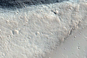 Fossae Intersecting Wrinkle Ridge East of Olympus Mons