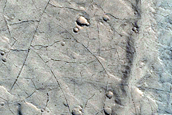 Steep-Front Deposit with Light-Toned Layers in Northern Arabia Terra