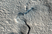 Possible Terminus of Glacial Valley Flow in Phlegra Montes