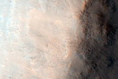 Channel and Crater North of Huygens Crater