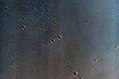 Channel Entering Orson Welles Crater