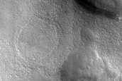 Lineated Valley Floor Material in Coloe Fossae